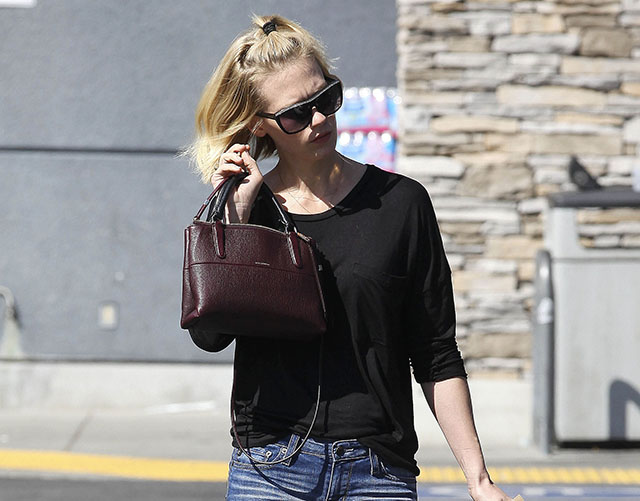 Coach January Jones Carries a Little Version of Coach’s Big New Bag