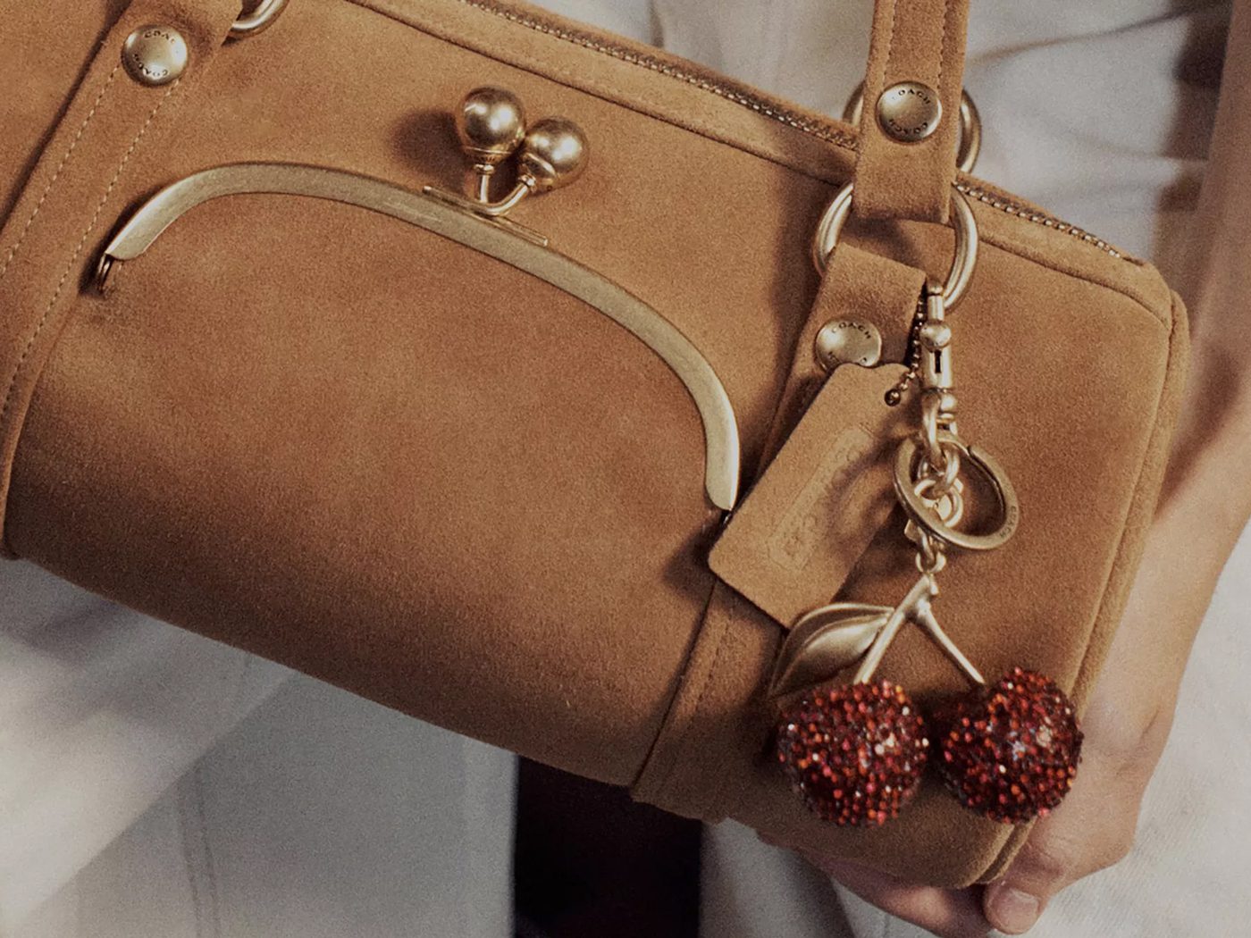 Coach Introduces the Kisslock Barrel Bag and It Instantly Sells Out