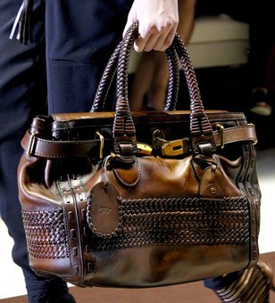 Fashion Week Handbags: Gucci Spring 2011: Key Design Notes — carrying and styling reference