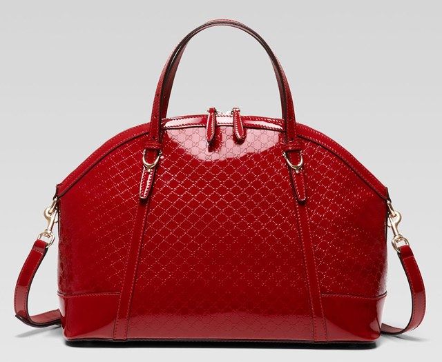 Gucci embraces big buckles, animal print for Fall 2013: Collection Guide — carrying and styling reference