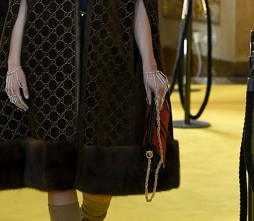 Gucci Logo Weave Shoulder Bag: Styling Guide — carrying and styling reference
