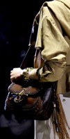 Gucci presents the perfect purple for Spring 2011: Key Design Notes — carrying and styling reference