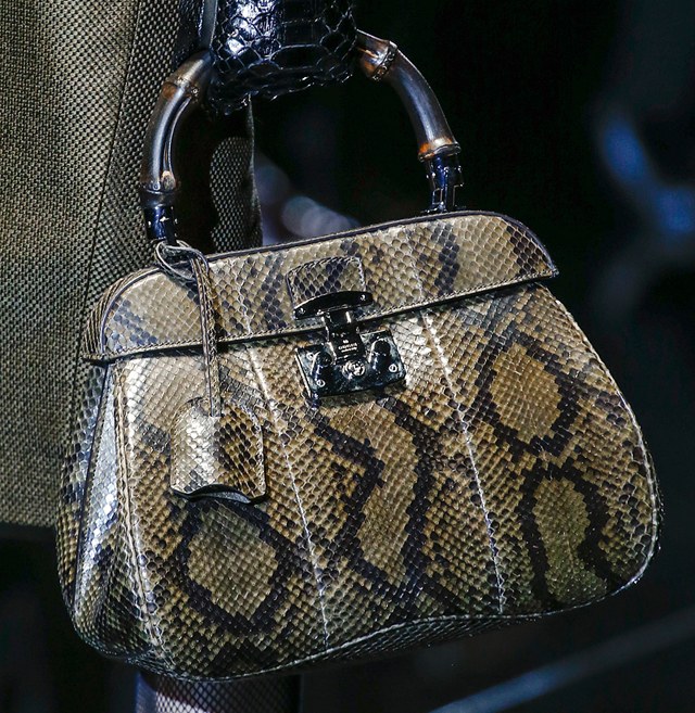 Gucci reimagines its signature bamboo for Fall 2013: Design Guide — carrying and styling reference