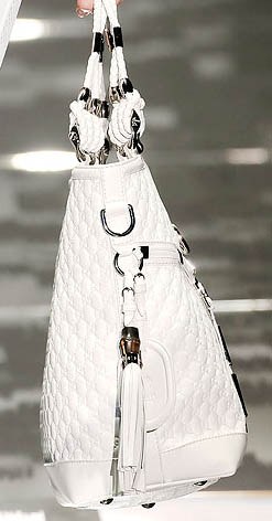 Gucci Spring 2009 Ready to Wear: Key Design Notes — carrying and styling reference