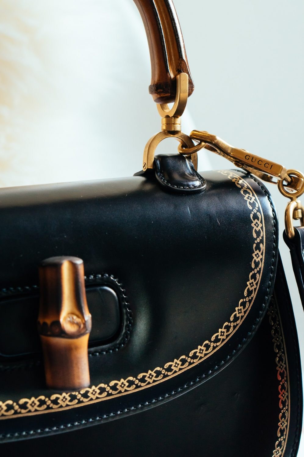 Loving Lately: Gucci’s Bamboo Classic Frame Top Handle Bag: Styling Guide — editorial overview