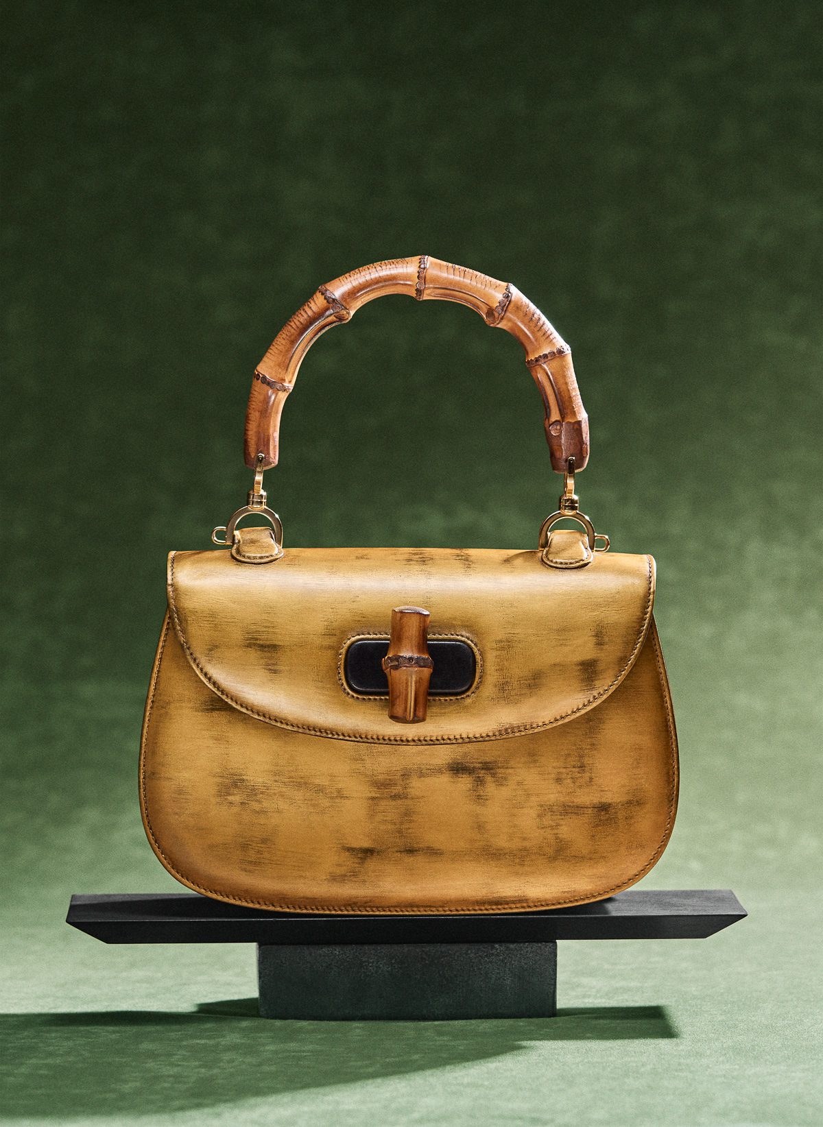 Miley Cyrus Accepts Grammy With Her Gucci Bamboo 1947 Bag in Hand: Styling Guide — carrying and styling reference