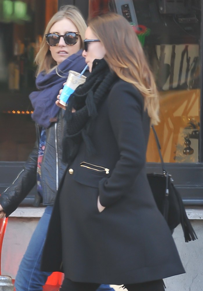 Olivia Wilde Goes All Black with a Gucci Fringe Bag: Styling Guide — shape and proportion reference