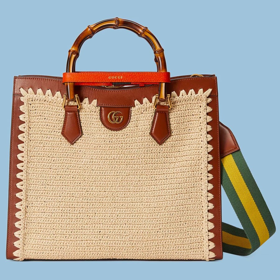 RuPaul Works It With a Gucci Tote Bag: OutletCity Guide — editorial overview