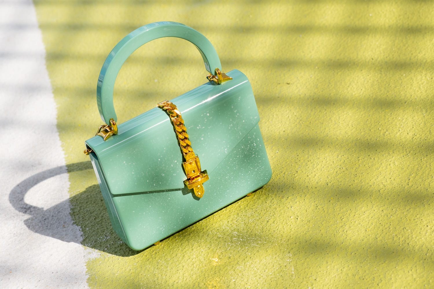 The Latest Statement Piece from Gucci Is the Sylvie 1969 Plexiglas Mini Bag: Design Guide — design detail