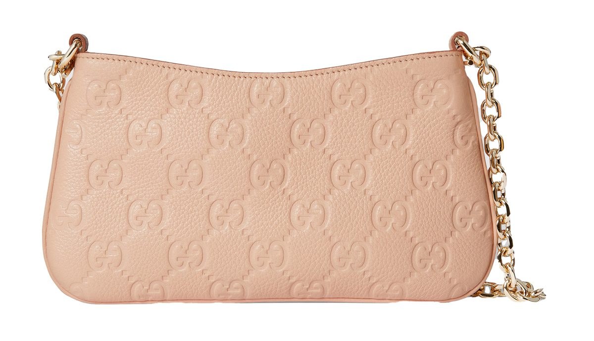The New Gucci GG Emblem Bag Is Classicly Gucci: OutletCity Guide — carrying and styling reference